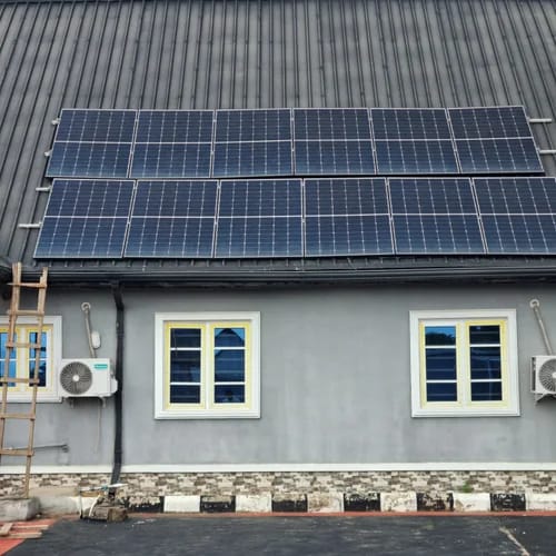 Image showing 12 solar panels installation for a residential building providing efficient home energy.