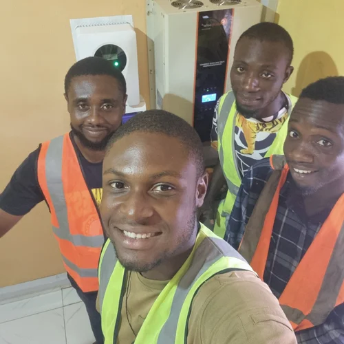 Image showing Team group photo after completing a solar system installation.